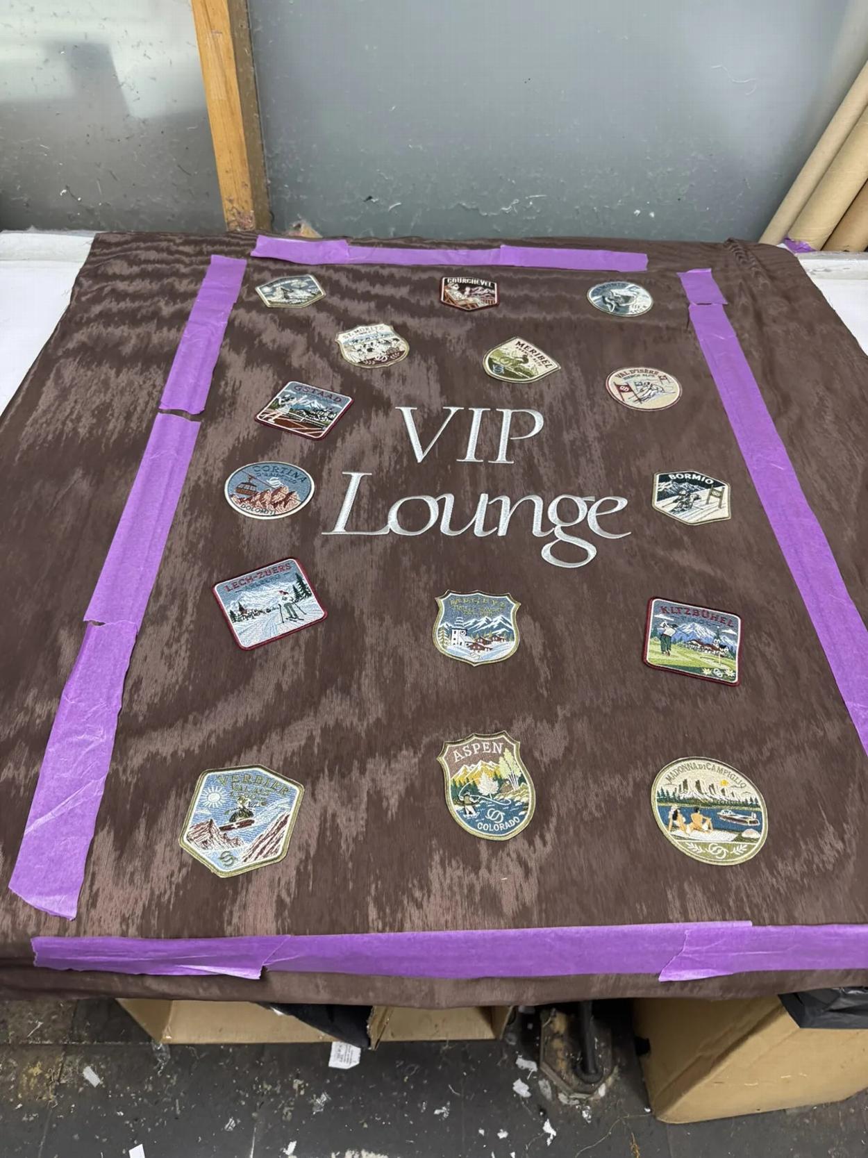 Embroidery machine and completed Decorex badges
